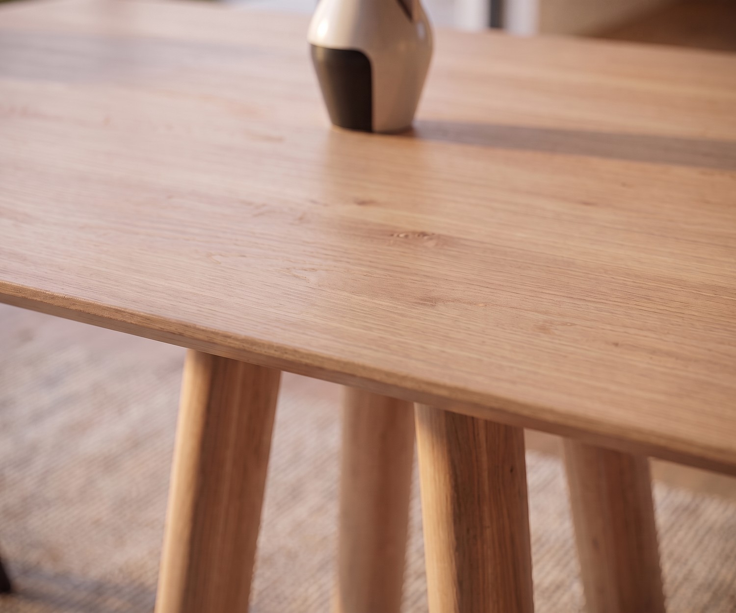 Eettafel al2 mos-i-ko 001 a voor de eetkamer van massief eikenhout in Scandinavische stijl met ronde poten.