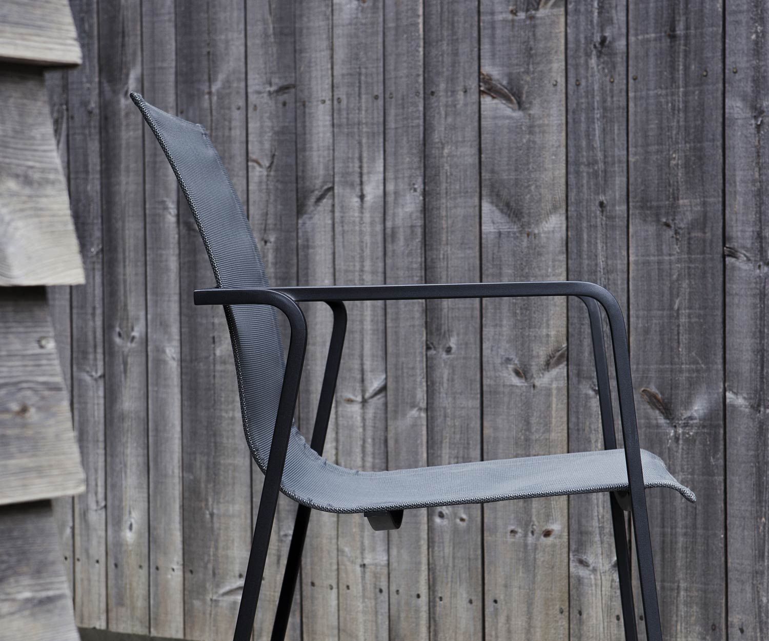 Moderne Oasiq Muze design fauteuil antraciet stoffen bekleding grijs