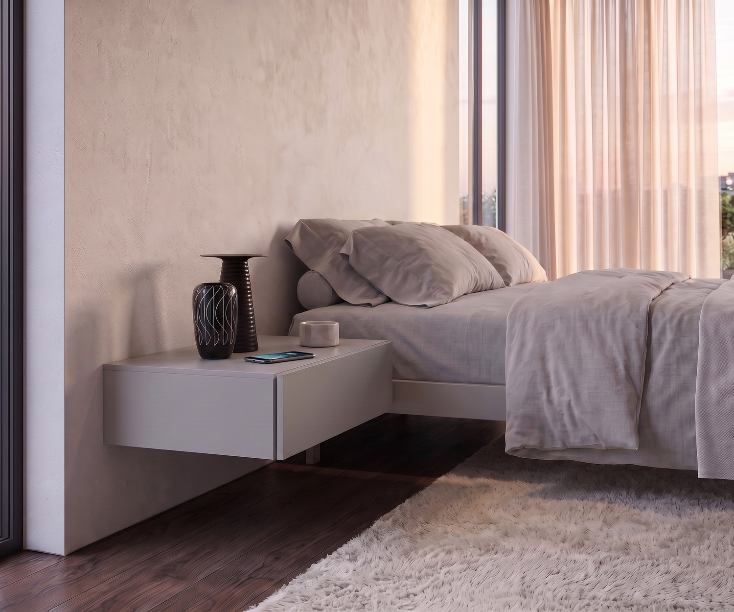 Zwevend nachtkastje Novamobili Easy met 1 lade naast een modern bed in een minimalistische slaapkamer.
