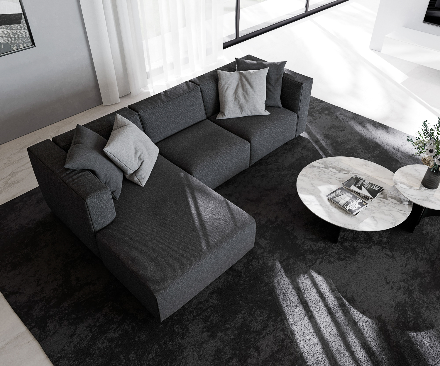 Zwarte Prostoria Sofa Match L met recamiere van boven met salontafel in design flat voor balkonraam 2 zits drie zits