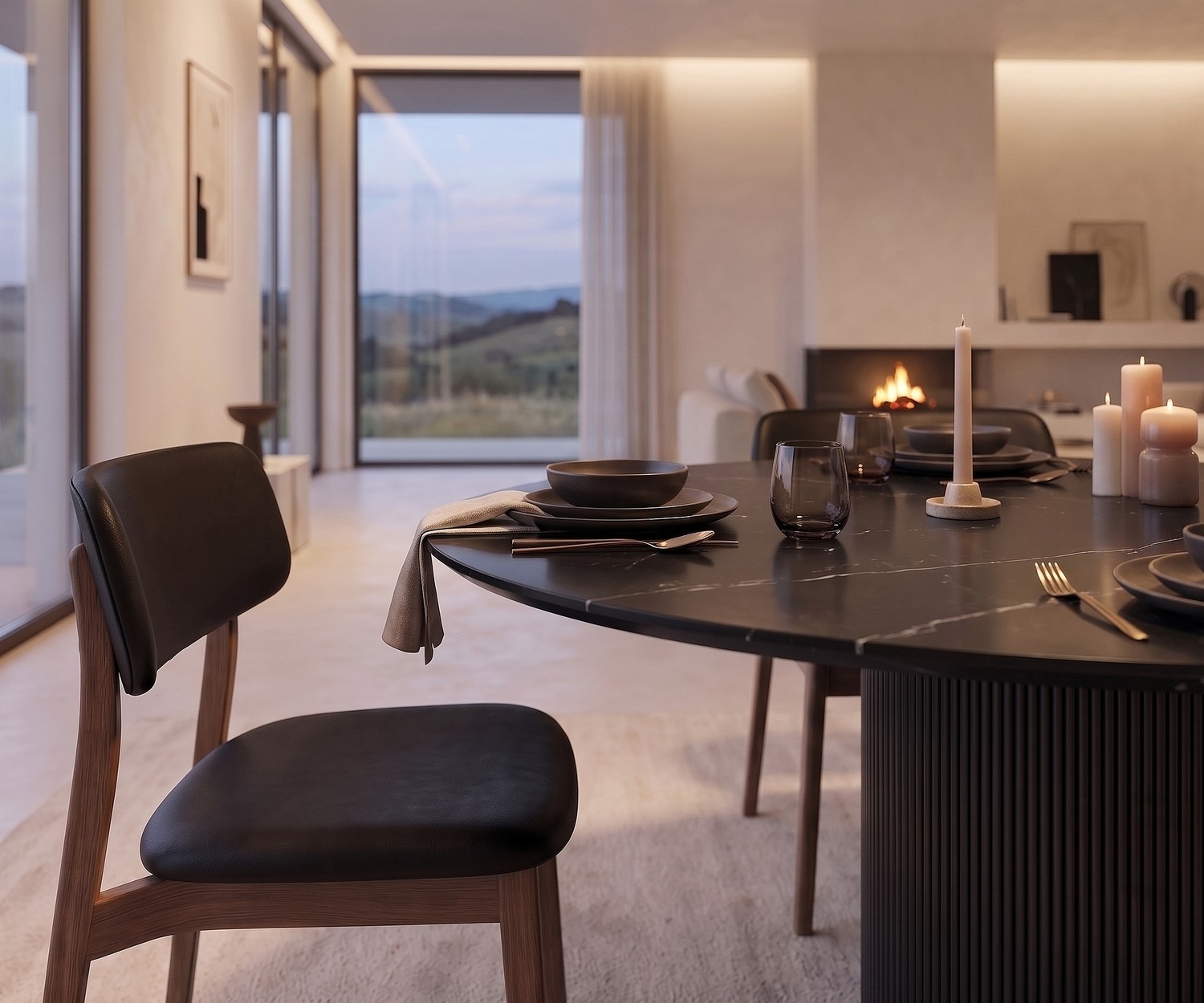 al2 dakry br 001 ronde design eettafel al2 dakry br 001 ronde eettafel in een moderne eetkamer met een zwart keramisch blad, geribbelde poot en designstoel.